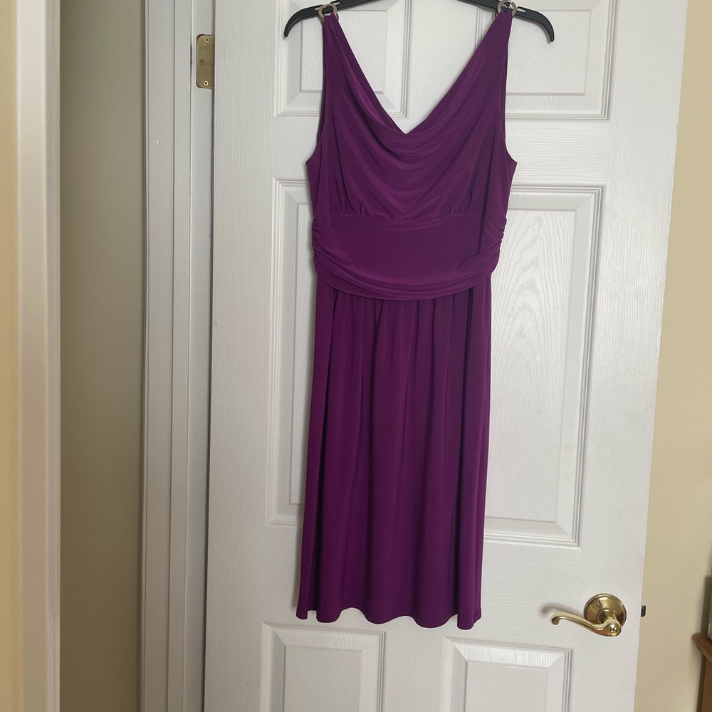 Fuschia color, stretch fabric polyester/spandex blend dress.